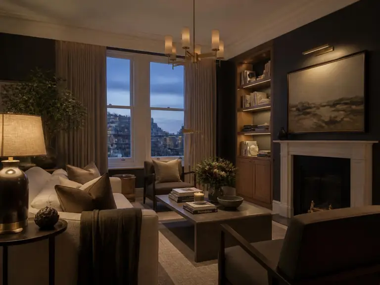 Designed living room in an Indian home with custom joinery and warm lighting